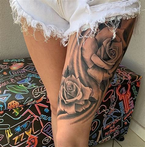 tattoo flor na coxa feminina|Tatuagem na coxa para mulheres: 39 versões。